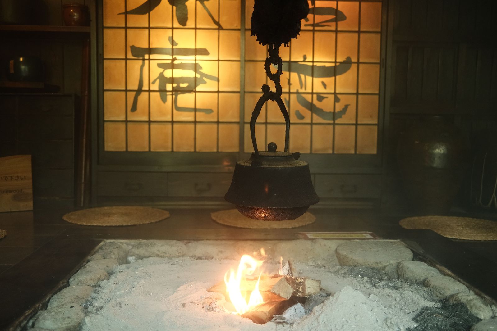 Irori hearth with hanging kettle